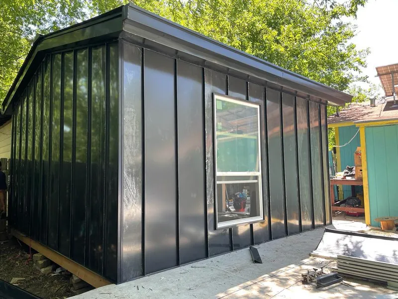 Black standing seam metal wall panels for Metal Roof Installation in Oxford